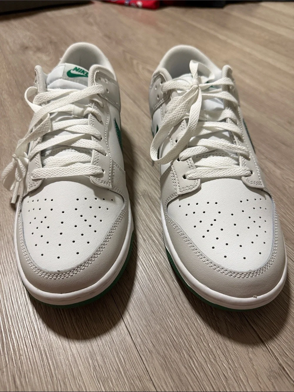 Nike White Low-Top Sneakers with Green Swoosh